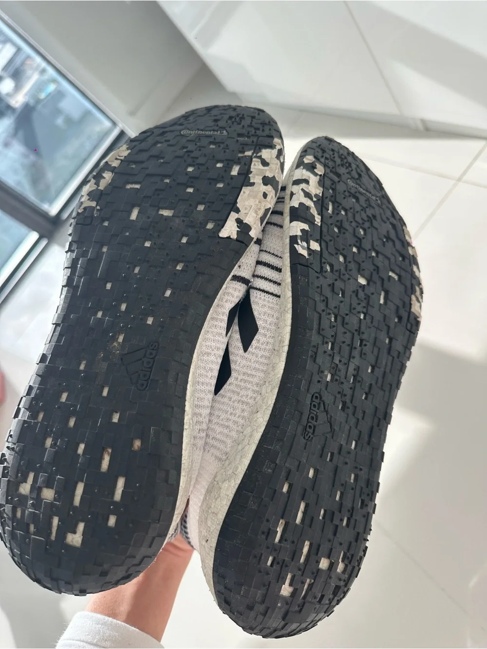 adidas White and Black Running Shoe with Boost Midsole